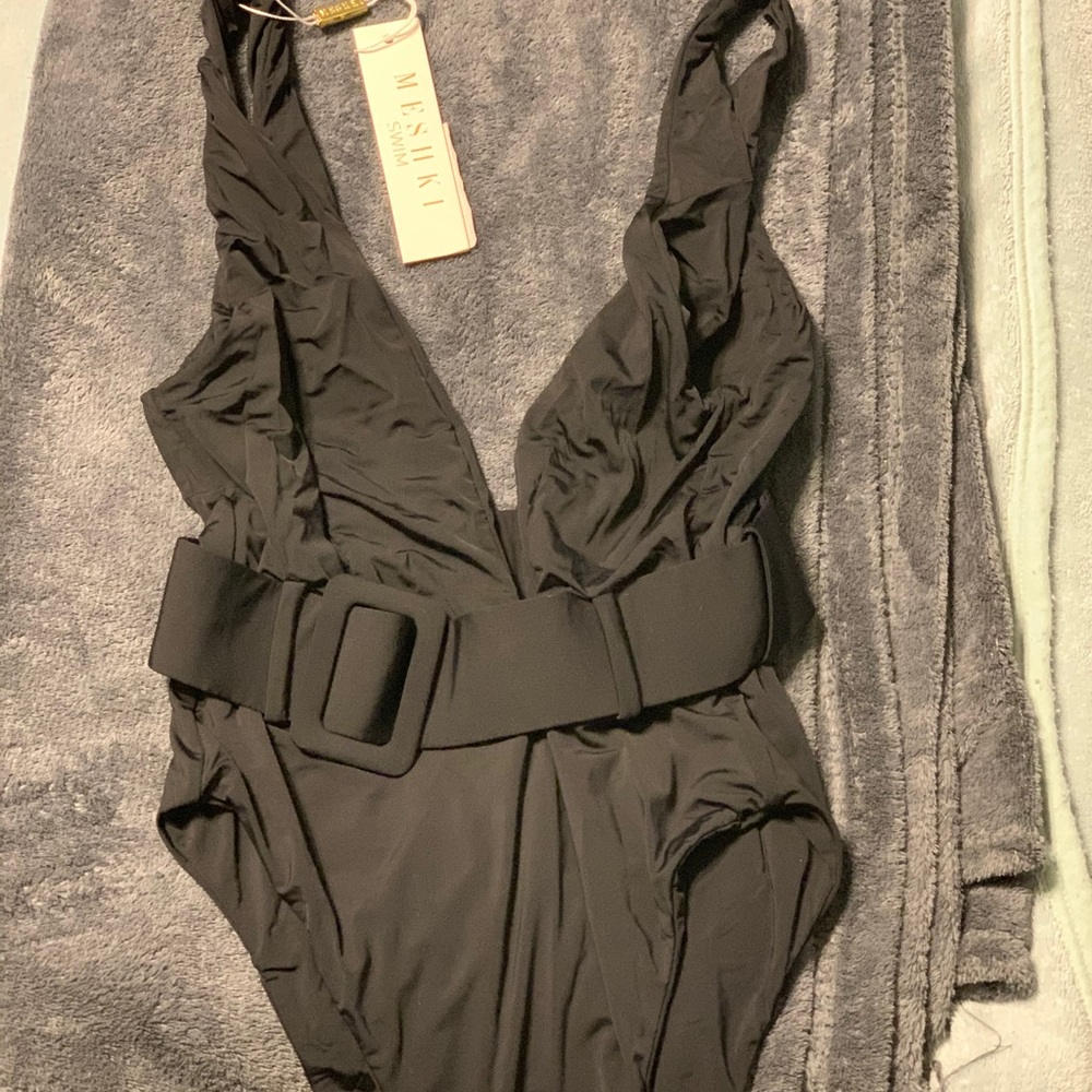 One piece bathing suit new with tags.